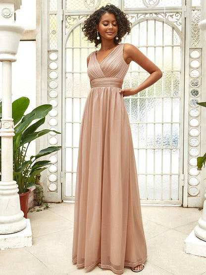 Women's Peach Glitter Georgette Party Wear Gown – Sleeveless V-Neck Maxi Dress